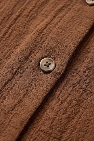 Detalle textura crepe y bot&oacute;n